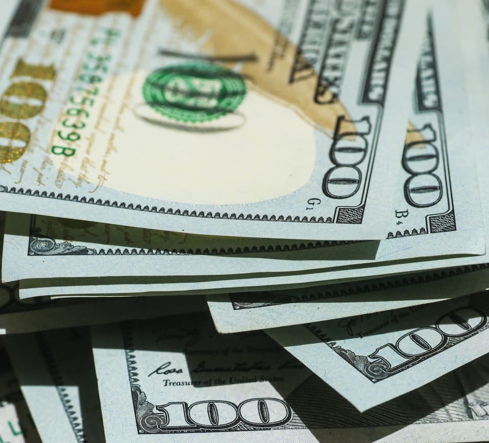 Stack of hundred dollar bills